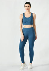 Waylene Teal Tracksuit for women, showcasing a scoop neck sports bra and comfortable leggings.