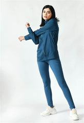 Waylene Teal Track Suit for Women Stretching Pose with High Collar Jacket