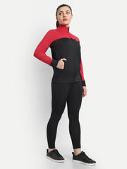 Waylene Women's Red and Black Colorblock Tracksuit, side view with hands in pockets.
