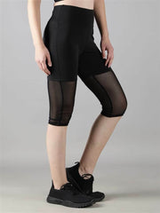Waylene Women's Black Capri Tights, side view highlighting mesh panels