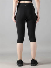 Waylene Black Skinny Fit Capri Tights, rear view, showing seamless design and snug fit.