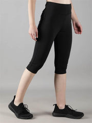 Waylene Black Skinny Fit Capri Tights, angled view, highlighting sleek fit and stretchy fabric.
