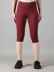 Waylene Wine Capri Tights, front angle with logo detail