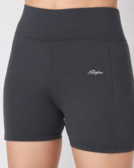 Close-up detail of white Waylene logo on dark grey high waist activewear shorts