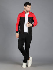 Waylene's red and black slimfit training tracksuit for men, featuring a model in a relaxed pose with a hand in pocket, wearing a red and black zip-up jacket and black pants, paired with white sneakers.