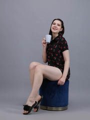 Waylene Cherry-Printed Black Shirt & Shorts Set, seated pose, casual style.