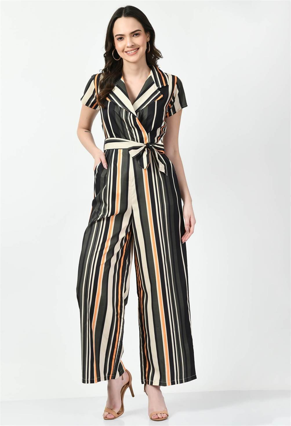Waylene's striped multi-color collared jumpsuit featuring a v-neckline, short sleeves, and a tie waist. Model stands smiling in a neutral pose on a white background.