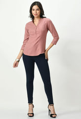 Waylene Soft Pink Tailored Shirt for Women styled with dark jeans, highlighting its versatile and chic design.