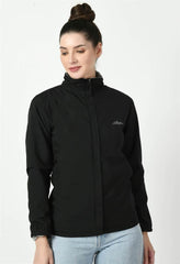 Front view of Waylene's black waterproof jacket with a zipper closure and high collar, modeled by a woman facing the camera with a relaxed pose.