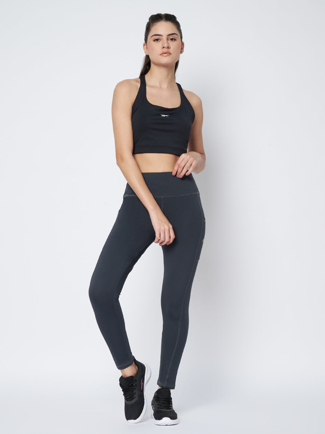 Waylene Dark Grey High-Rise Leggings styled with a black crop top, ideal for fitness activities.