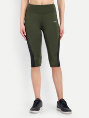 Woman in Waylene olive green high-waisted sports capris with mesh panels front view