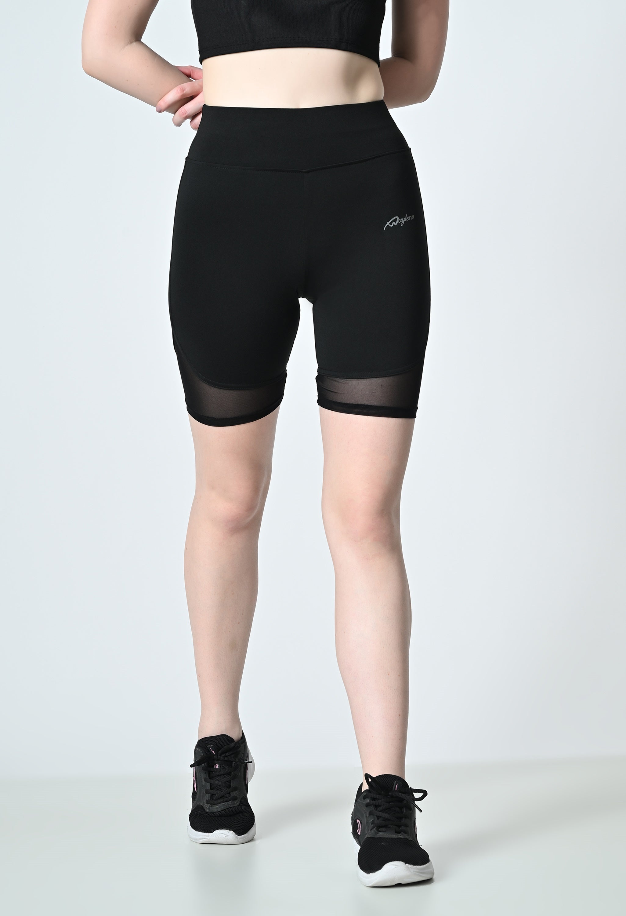 Waylene Black Gym Shorts, front view highlighting high-rise design and mesh details.