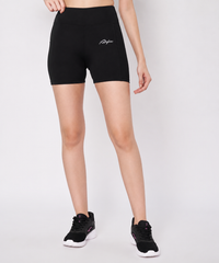 Waylene women's high-waisted black activewear shorts front view paired with black sports shoes
