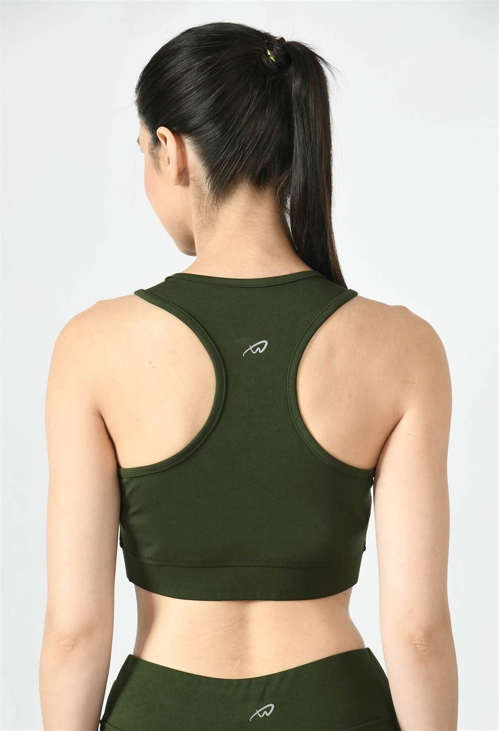 Model showcasing the comfortable fit of Waylene's olive green sports bra back view