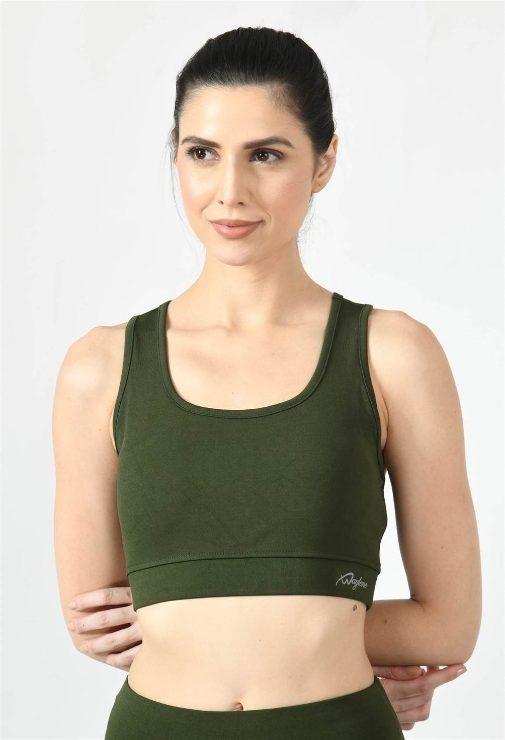 Model showcasing the comfortable fit of Waylene's olive green sports bra close view