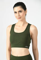 Model showcasing the comfortable fit of Waylene's olive green sports bra side view