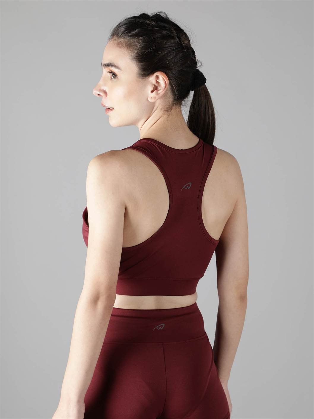 Close-up of Waylene maroon (wine) sports bra showing racerback design and lightly padded cups back view