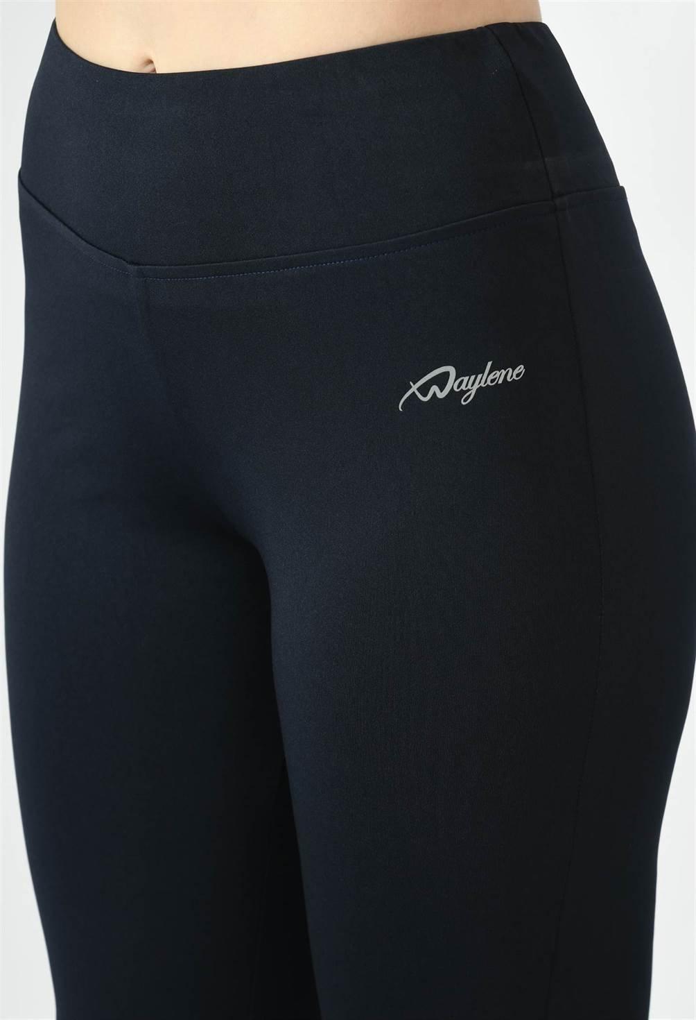 Close-up of Waylene black yoga leggings showing slim-fit and 4-way stretch fabric.