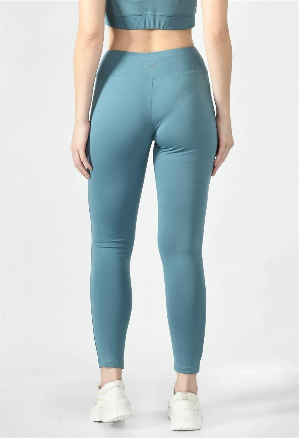 Waylene's light blue (Air Force Blue) high-waisted yoga leggings back view.