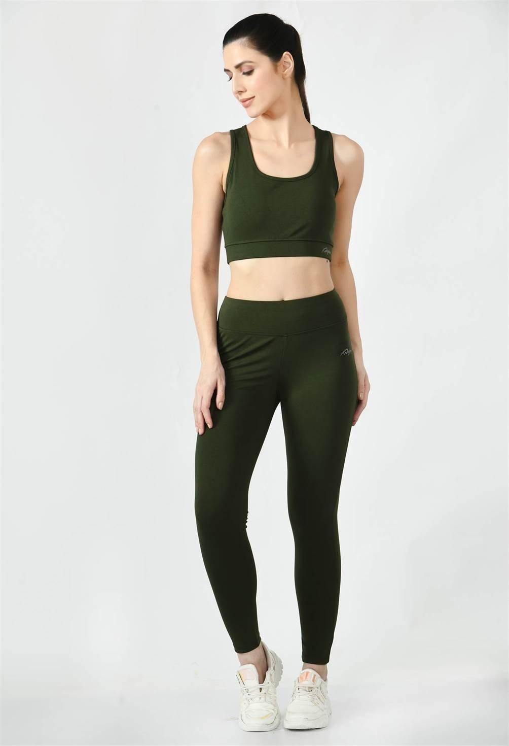 Woman practicing a yoga pose in Waylene's olive green high-waisted yoga leggings - pose 2