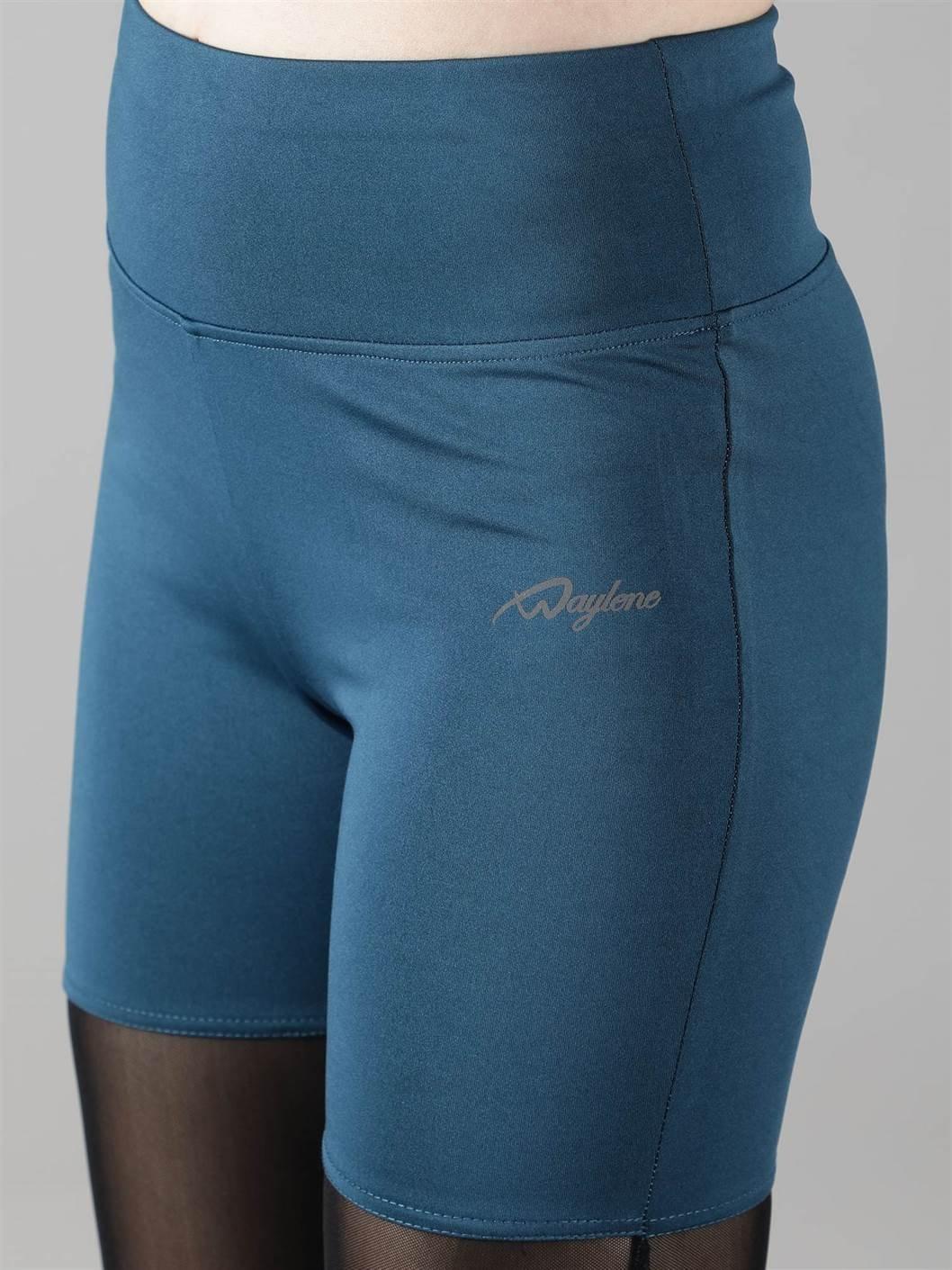 Woman performing yoga poses in Waylene light blue (teal) high-waisted sports capris with rounded mesh panels - fabric close view